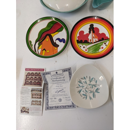 165 - A mixed lot of ceramics to include two limited edition Clarice Cliff reproduction collections plates... 