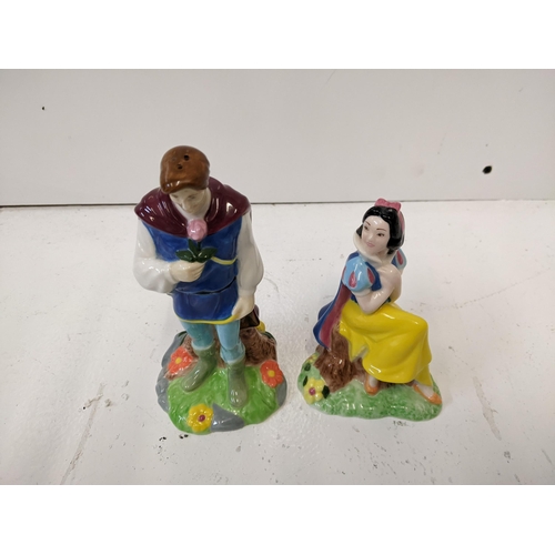 167 - Four Paul Carden Disney figures to include: Snow White and Prince salt and pepper shakers, Cinderell... 