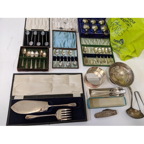 169 - A collection of silver plated items to include boxed and unboxed flatware. a Wedgewood Vera Wang pot... 