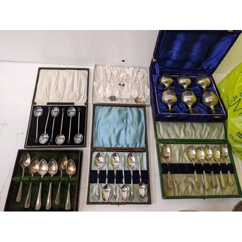 169 - A collection of silver plated items to include boxed and unboxed flatware. a Wedgewood Vera Wang pot... 