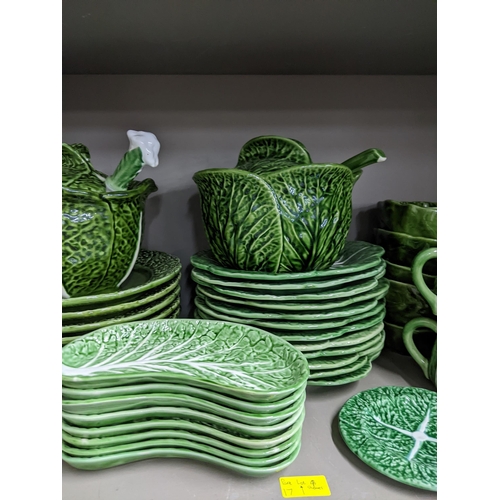 17 - A Portuguese Bordallo Pinheiro cabbage leaf patterned Majolica dinner service to include dinner plat... 