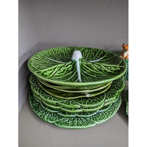 17 - A Portuguese Bordallo Pinheiro cabbage leaf patterned Majolica dinner service to include dinner plat... 