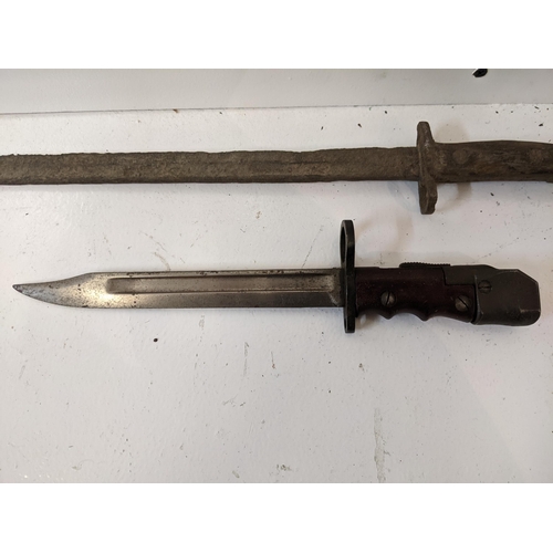 173 - A British Bayonet no 7 MK1/L with swivel barrel attachment to the handle along with another longer b... 