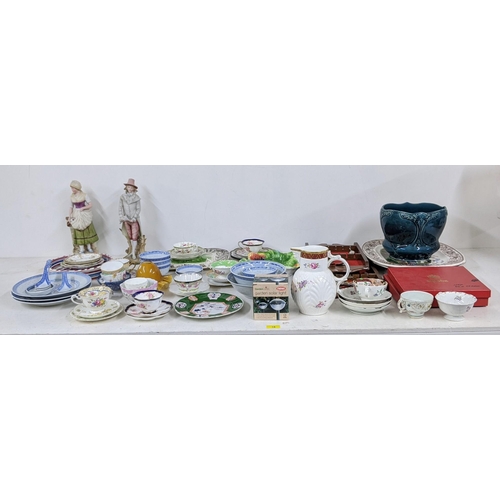 18 - A mixed lot of china and ceramics to include meat plates, Chinese style bowls, collectors spoons and... 