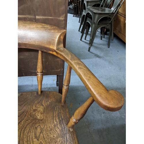 180 - An early 20th century beech and elm captains chair on turned legs
Location: GM
If there is no condit... 