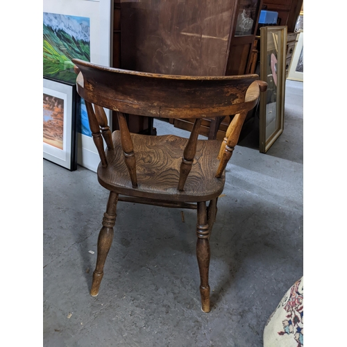 180 - An early 20th century beech and elm captains chair on turned legs
Location: GM
If there is no condit... 