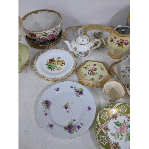 20 - A mixed china to include Spode Christmas plates, Bartlam teapots and other vases with floral decorat... 