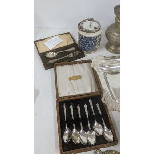 53 - Silver plate and metalware to include spoons, egg coddler, a wat jug and other items
Location:
If th... 