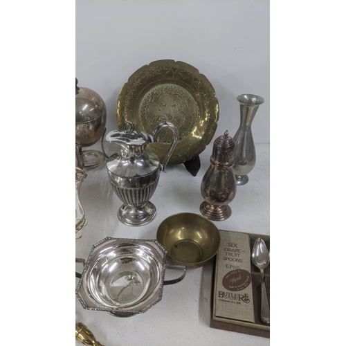 53 - Silver plate and metalware to include spoons, egg coddler, a wat jug and other items
Location:
If th... 