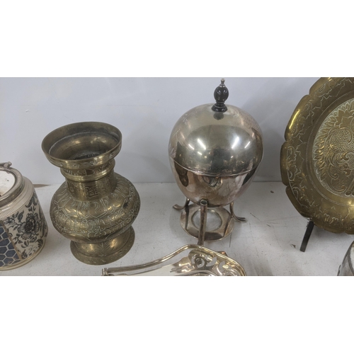 53 - Silver plate and metalware to include spoons, egg coddler, a wat jug and other items
Location:
If th... 