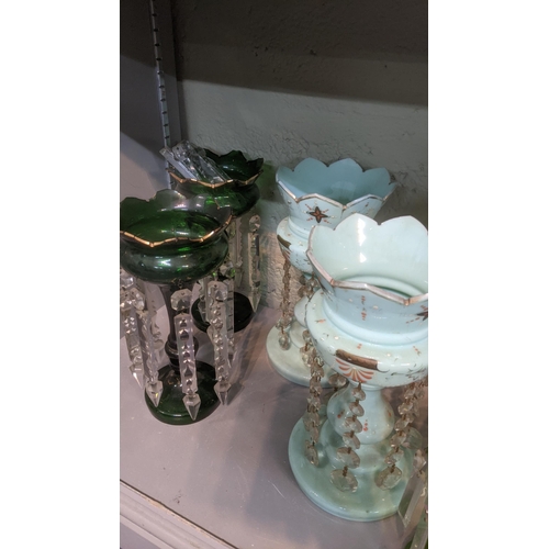 58 - A group of 19th century and later lustre vases to include a Victorian mantle green glass and guilt e... 