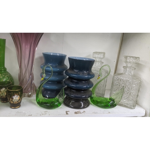 60 - An 19th century and later glassware to include: a pair of Victorian Mary Gregory large green vases, ... 