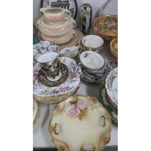 63 - Mixed ceramics and collectables to include a pottery sculpture of a pig, vases, decorative cups and ... 