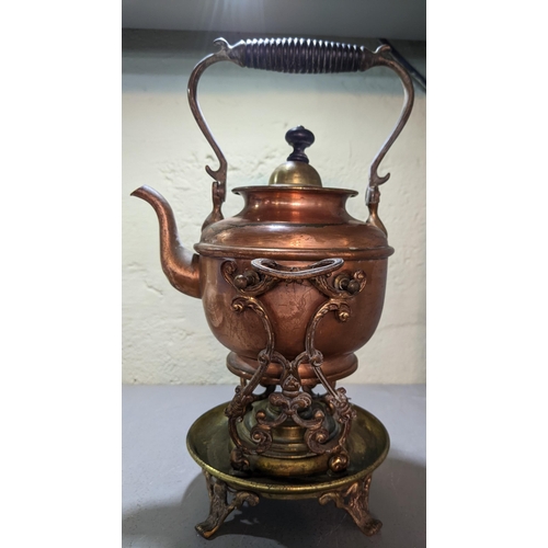 7 - A copper spirit kettle on an ornately decorated stand Location: 5.1
If there is no condition report ... 