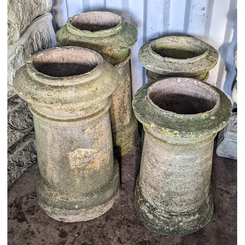 72 - Two pairs of Victorian terracotta chimney pots, the largest pair 64cm h, the smaller 55cm h
Location... 