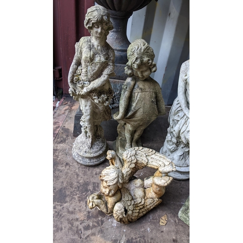 73 - A selection of garden ornaments to include one of a classical seated female and others
Location: RC
... 