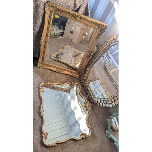 83 - Four mirrors to include a gilt framed example with bevelled glass and moulded floral scroll design, ... 