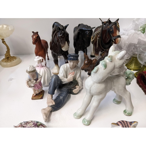 141 - A collection of ceramic ornaments to include a Beswick donkey A/F, a Royal Doulton 'Buttercup' figur... 