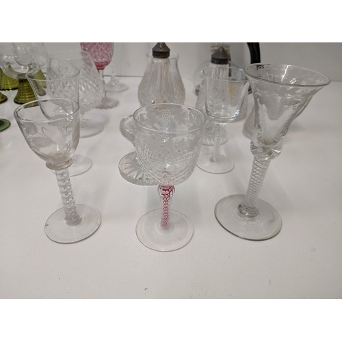 143 - A mixed lot of glassware to include a Victorian honeycomb goblet with red and opaque inverted Allist... 