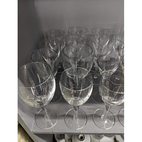 27 - A large selection of glassware to include some crystal, wine glasses, tumblers and other items
Locat... 