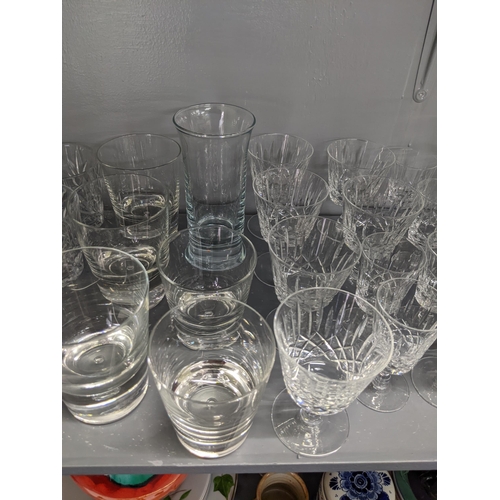 27 - A large selection of glassware to include some crystal, wine glasses, tumblers and other items
Locat... 