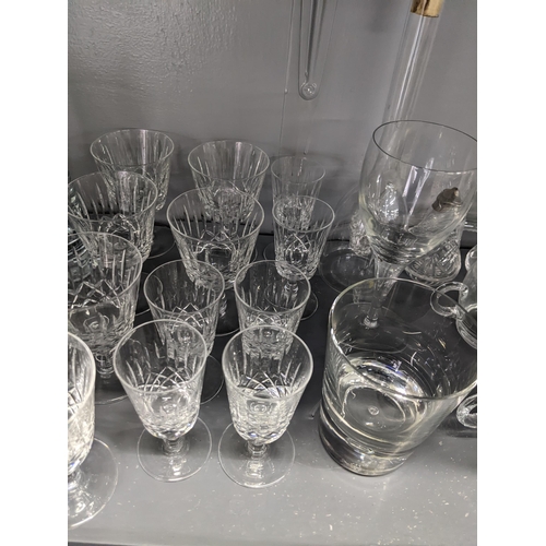 27 - A large selection of glassware to include some crystal, wine glasses, tumblers and other items
Locat... 