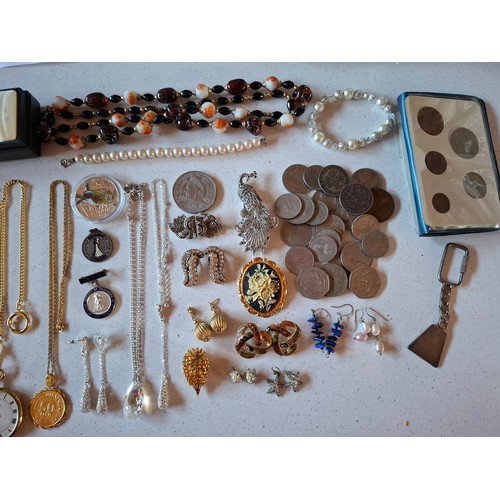 37 - A mixed lot comprising costume jewellery, coins and a boxed Cross pen set to include marcasite brooc... 