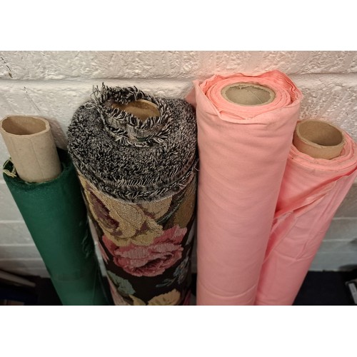 45 - Various bolts of fabric comprising a Brunswick Green cotton twill in approx a 4m length, a pale pink... 