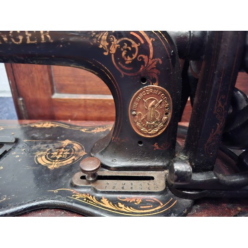 108 - An 1880's/90's Singer 12k 'New Family' sewing machine in a mahogany case, serial number 5804346 1244... 