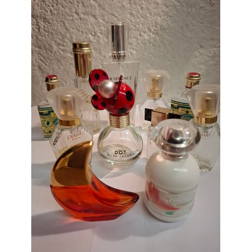 111 - A collection of mainly empty fragrance bottles. Location: R1-4
If there is no condition report, plea... 