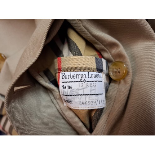 2 - Burberrys- A 1980's/90's ladies mid length Camden Heritage car coat, in a honey colour, UK12R, havin... 