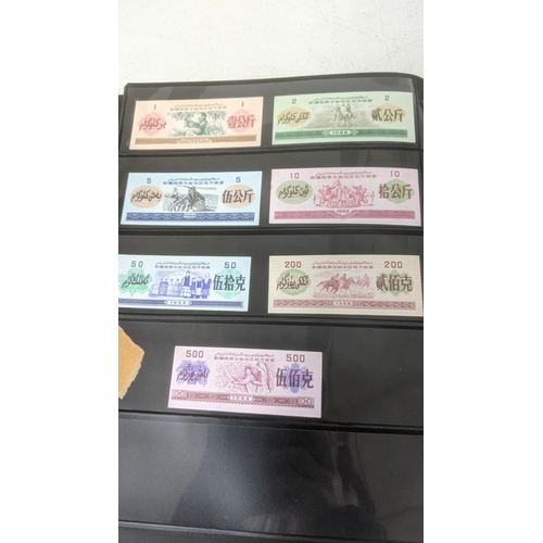 124 - Bank notes - Two albums comprising of Chinese Banknotes - Yuan Hong 80 cents note, Chinese central r... 