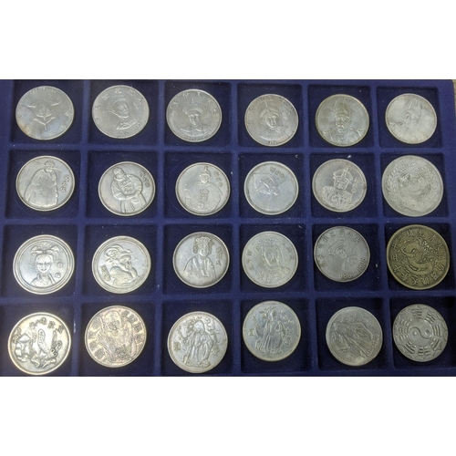 127 - A collection of white metal replica Chinese coins to include Qing Dynasty Emperors tokens, Xuantong ... 