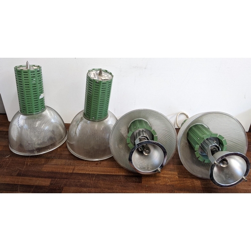 340 - Four Industrial style lights with green fittings and plastic transparent and translucent height adju... 