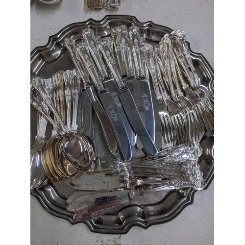 12 - Silver plate and EPNS items to include a tray, a large dish and a large collection of cutlery Locati... 