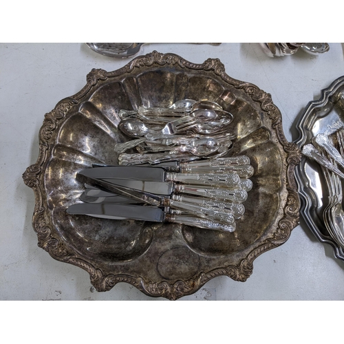 12 - Silver plate and EPNS items to include a tray, a large dish and a large collection of cutlery Locati... 