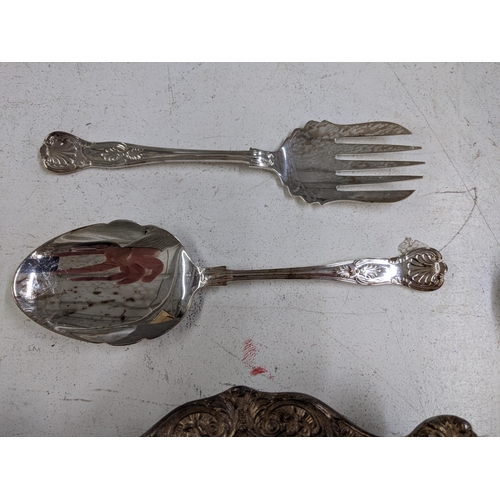 12 - Silver plate and EPNS items to include a tray, a large dish and a large collection of cutlery Locati... 