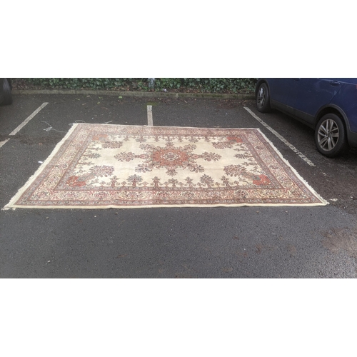 323 - A handwoven Persian mahal floral pattern rung with central motif on cream ground, triple guard borde... 