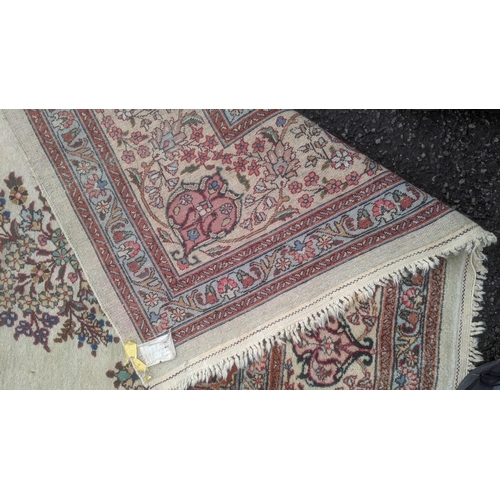 323 - A handwoven Persian mahal floral pattern rung with central motif on cream ground, triple guard borde... 