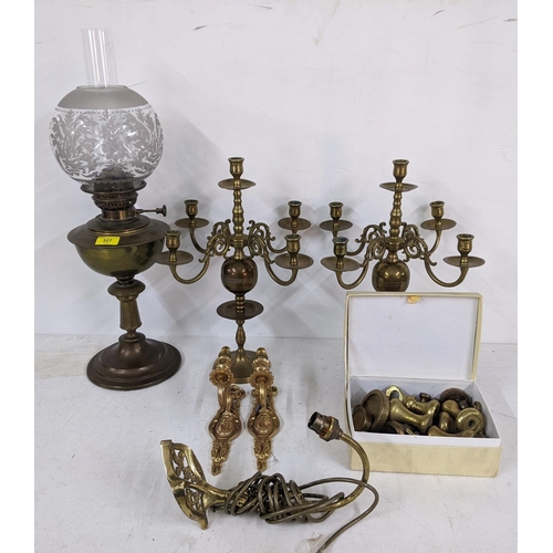 327 - Mixed metalware to include an oil lamp, a pair of four branch candelabras and a box of assorted weig... 