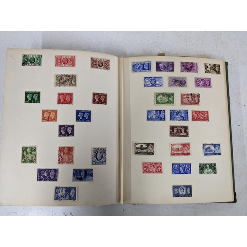 336 - A stamp album containing cigarette cards, pencil sketches and card cut-outs, a Mabel Lucie Attwell c... 