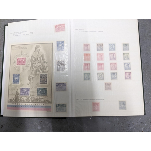 367 - A stamp collection of Czechoslovakian stamps mounted in four albums, along with a 1997 catalogue of ... 