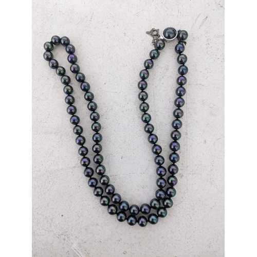 96 - A single string necklace of Tahitian style beaded pearls on a 925 silver catch Location: CAB 2
If th... 