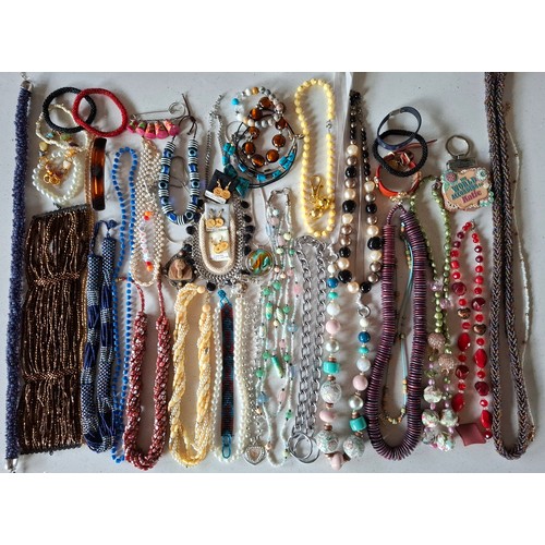 112 - A large quantity of modern costume jewellery, key rings, hair accessories, fashion and sports watche... 