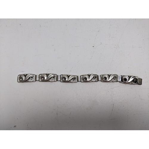 10 - A John Lauritzen Danish silver bracelet, with scrolled floral links, 19.5cm long
Location: CAB4
If t... 