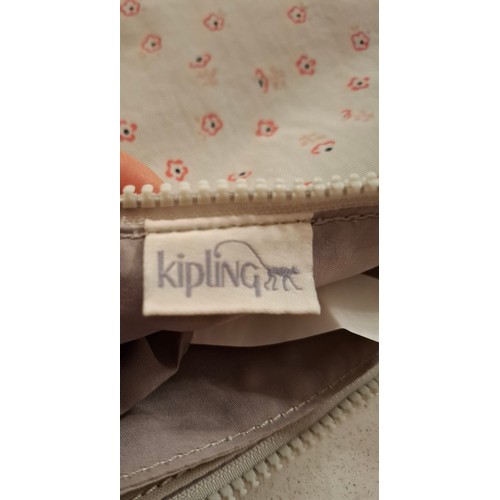 28 - Kipling-A group of 4 unused crossover bags in various designs, each with a monkey keyring to include... 