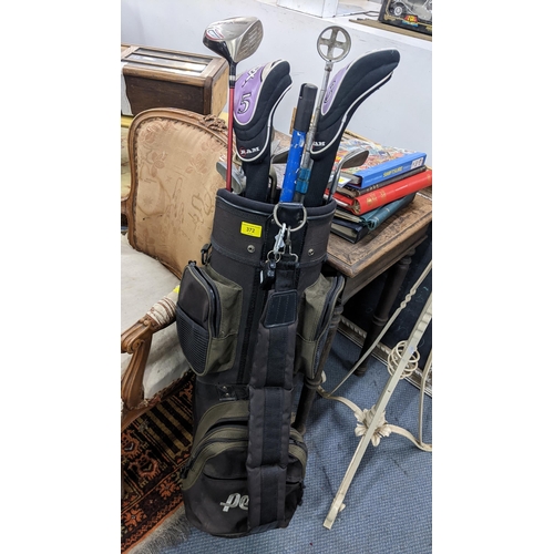 430 - A Penn golf bag containing mixed irons and drivers to include a Benross driver
Location: A3M
If ther... 