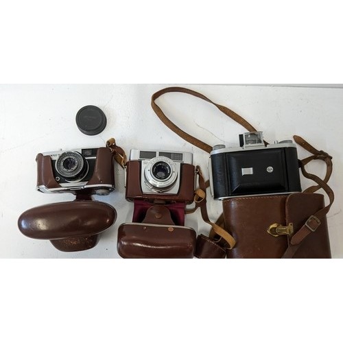 450 - Three vintage cameras to include and Olympus Trip 35, a Zeiss Ikon, an Ensign Selfix
Location:GR
If ... 