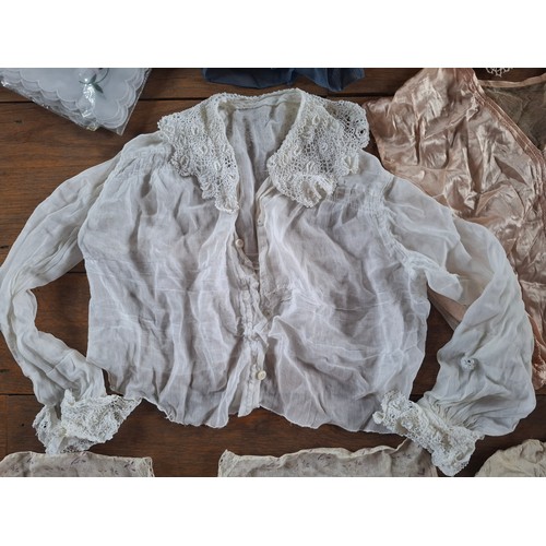 119 - Edwardian and later ladies and children's clothing to include an early 20th Century white blouse wit... 