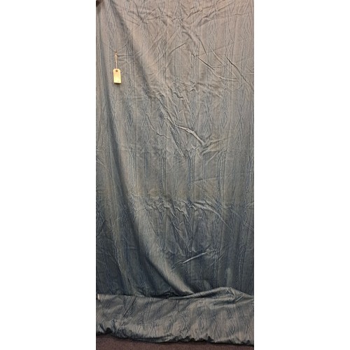 130 - A bolt of mid blue cotton fabric in a water silk design, approx  141cm wide x 20metres long. Locatio... 